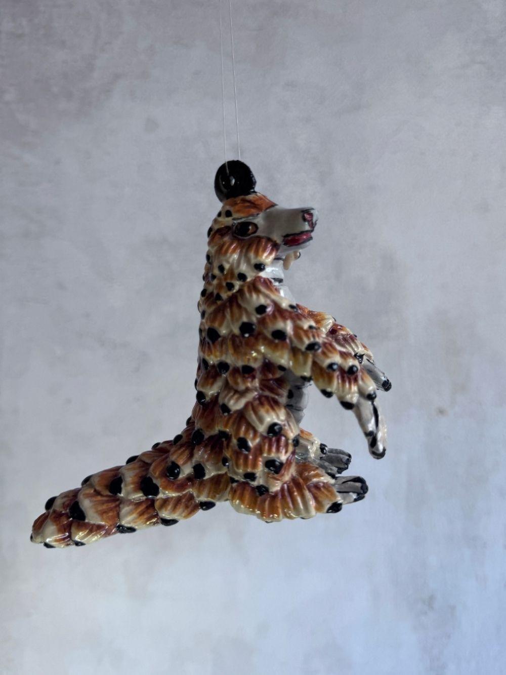 Handmade ceramics Pangolin sculpture by Rachael Wild, featuring detailed artistic craftsmanship in ceramic art.