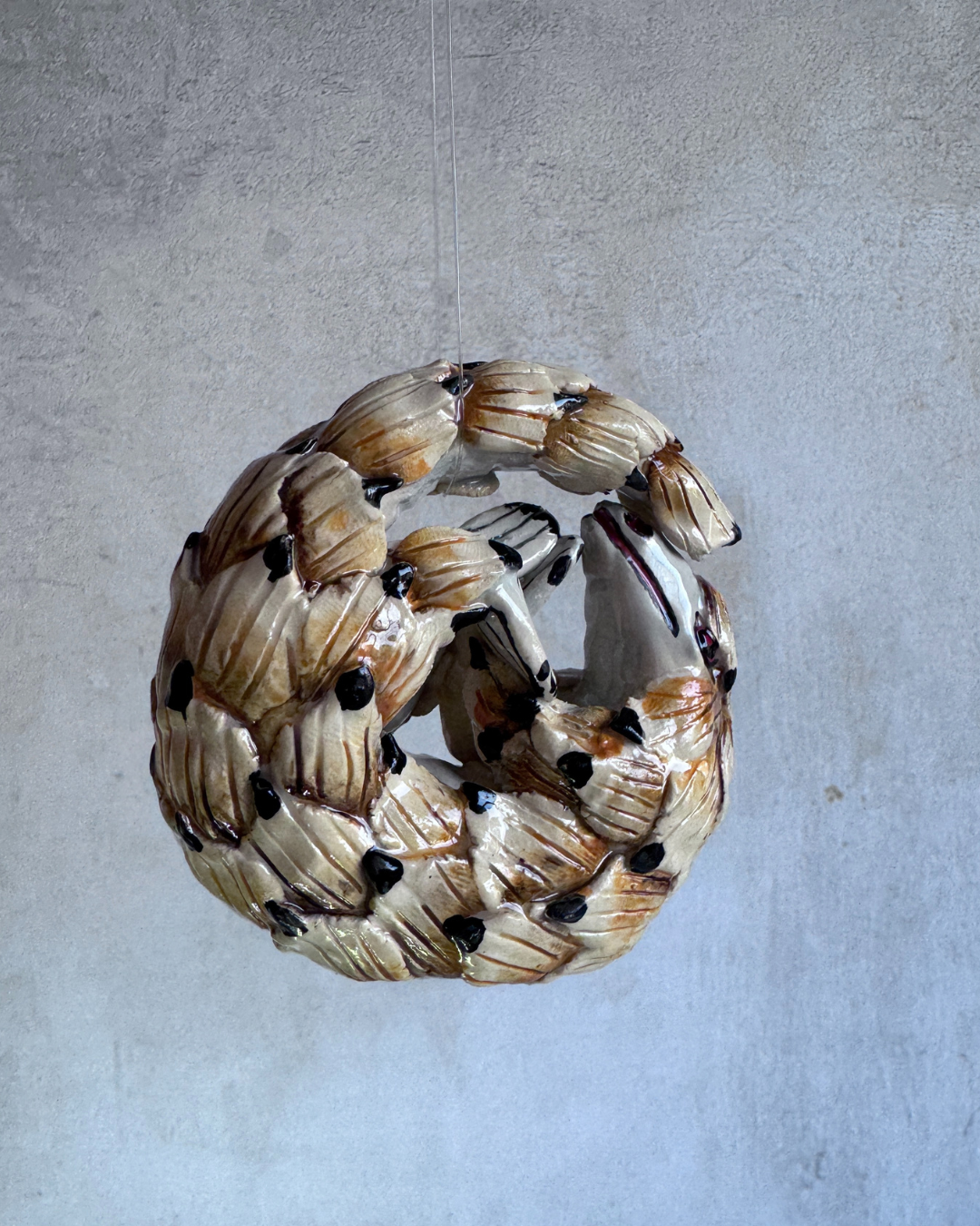 hanging ceramic sculptures endangered animals rachael wild south africa