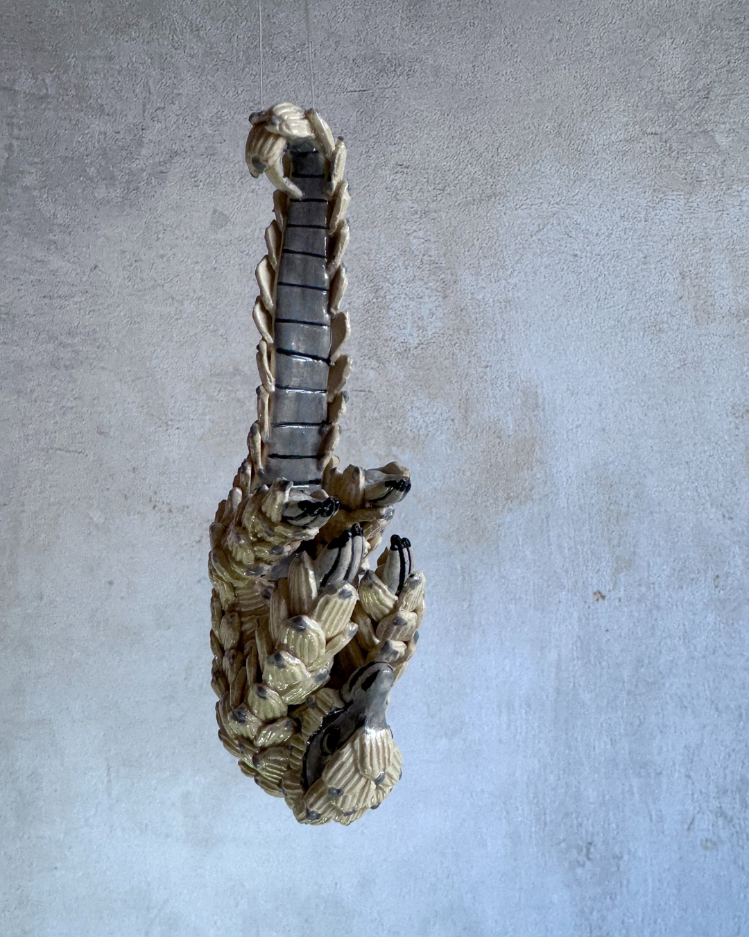 hanging ceramic sculptures endangered animals rachael wild south africa