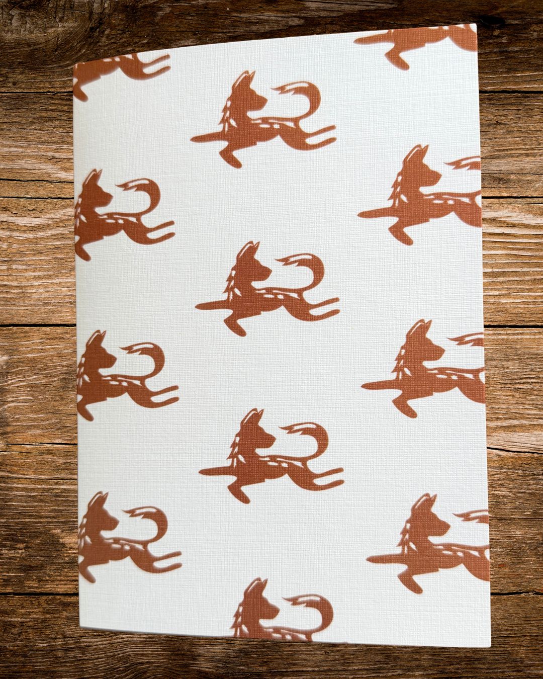 wild dog repeat card, a pattern of painted wild dogs