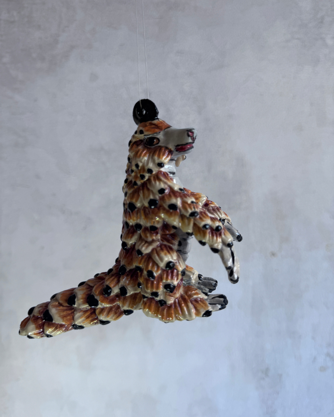 hanging ceramic sculptures endangered animals rachael wild south africa