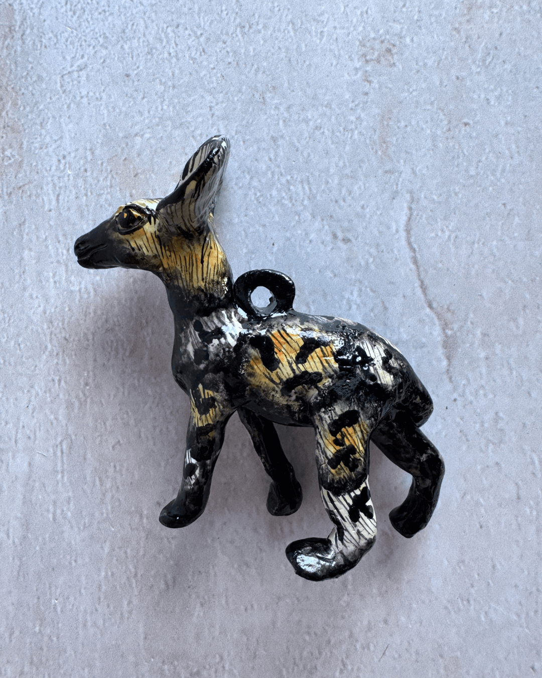 hanging ceramic sculptures endangered animals rachael wild south africa