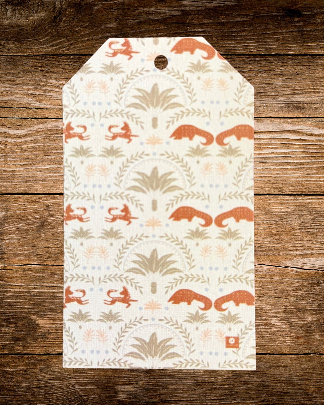 the arch gift tag, sage and terracotta arches of cycads and wild dogs