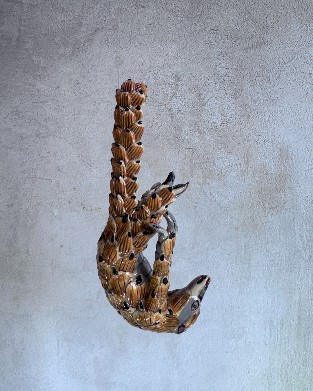 hanging ceramic sculptures endangered animals rachael wild south africa
