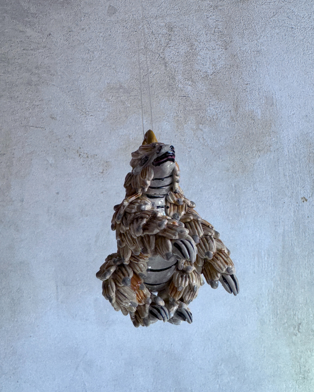 hanging ceramic sculptures endangered animals rachael wild south africa