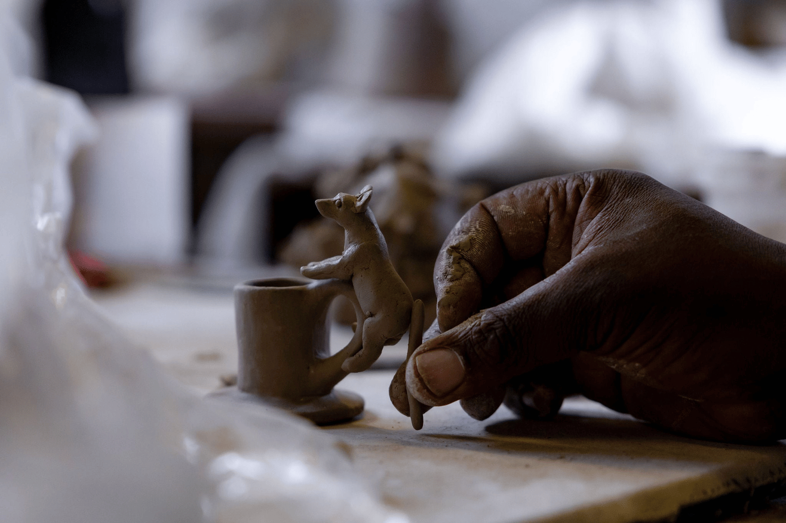 Handmade candle holder crafted by Rachael Wild, elegant design perfect for home decor and ambiance enhancement.