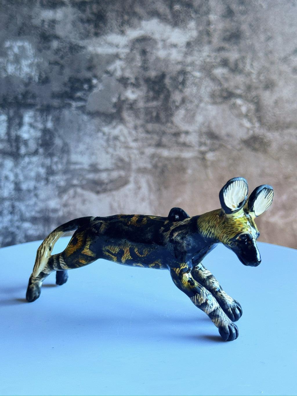 Handmade wild dog sculpture by Rachael Wild, showcasing exquisite craftsmanship and artistic detail.