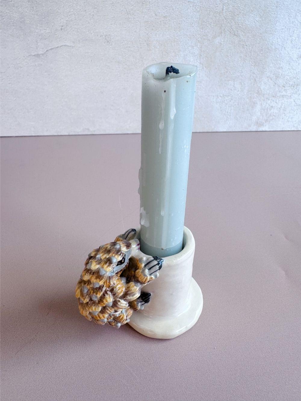 Handmade candle holder crafted by Rachael Wild, elegant design perfect for home decor and ambiance enhancement.