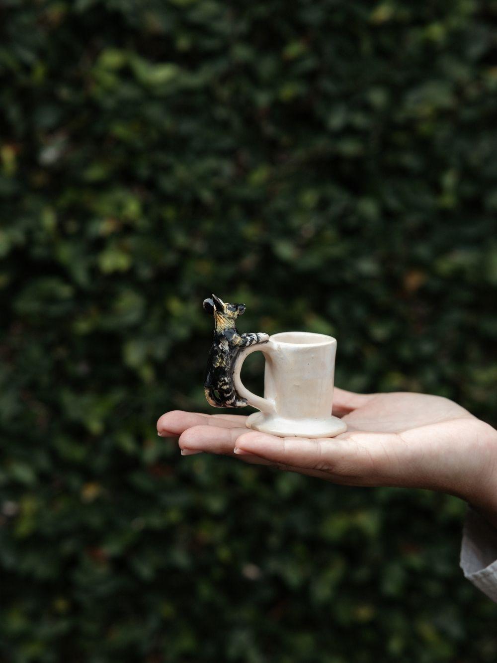 Handmade candle holder crafted by Rachael Wild, elegant design perfect for home decor and ambiance enhancement.