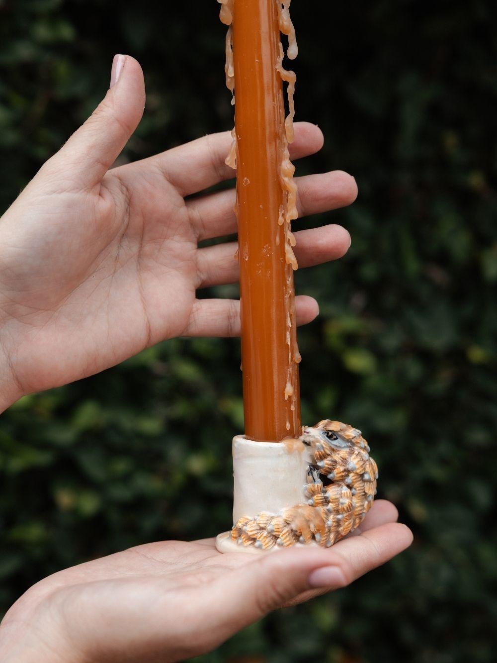 Handmade candle holder crafted by Rachael Wild, elegant design perfect for home decor and ambiance enhancement.