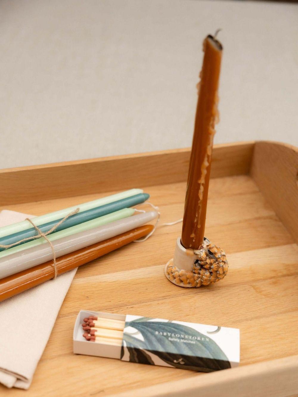 Handmade candle holder crafted by Rachael Wild, elegant design perfect for home decor and ambiance enhancement.