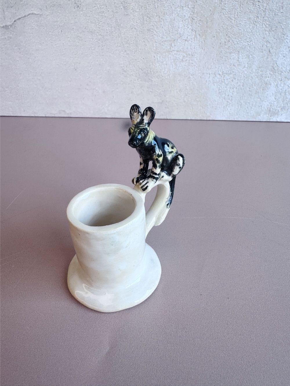 Handmade candle holder crafted by Rachael Wild, elegant design perfect for home decor and ambiance enhancement.