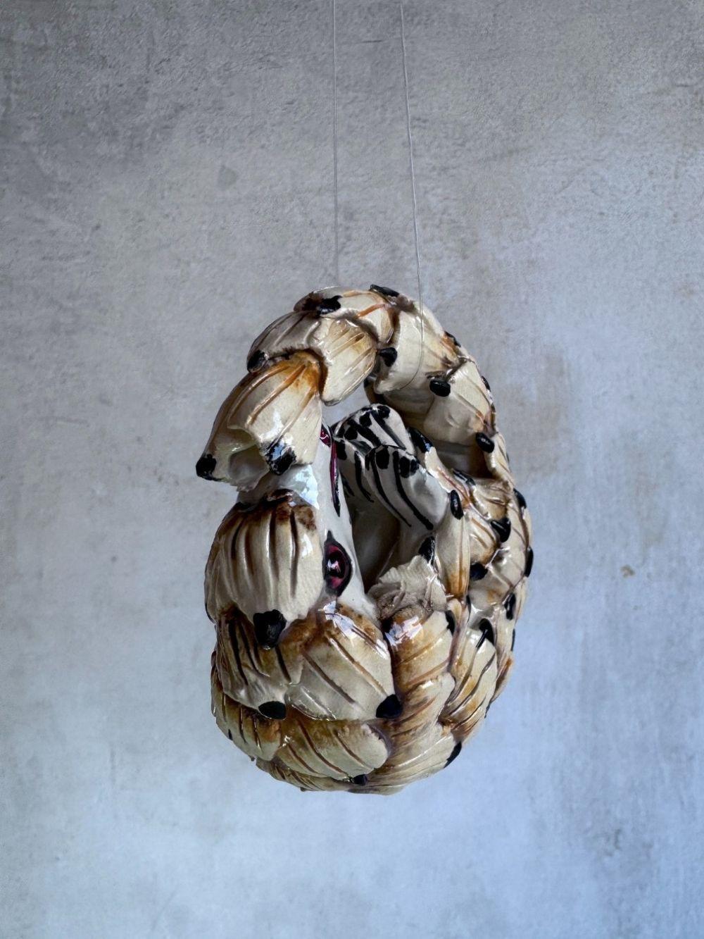 Handmade ceramics Pangolin sculpture by Rachael Wild, featuring detailed artistic craftsmanship in ceramic art.