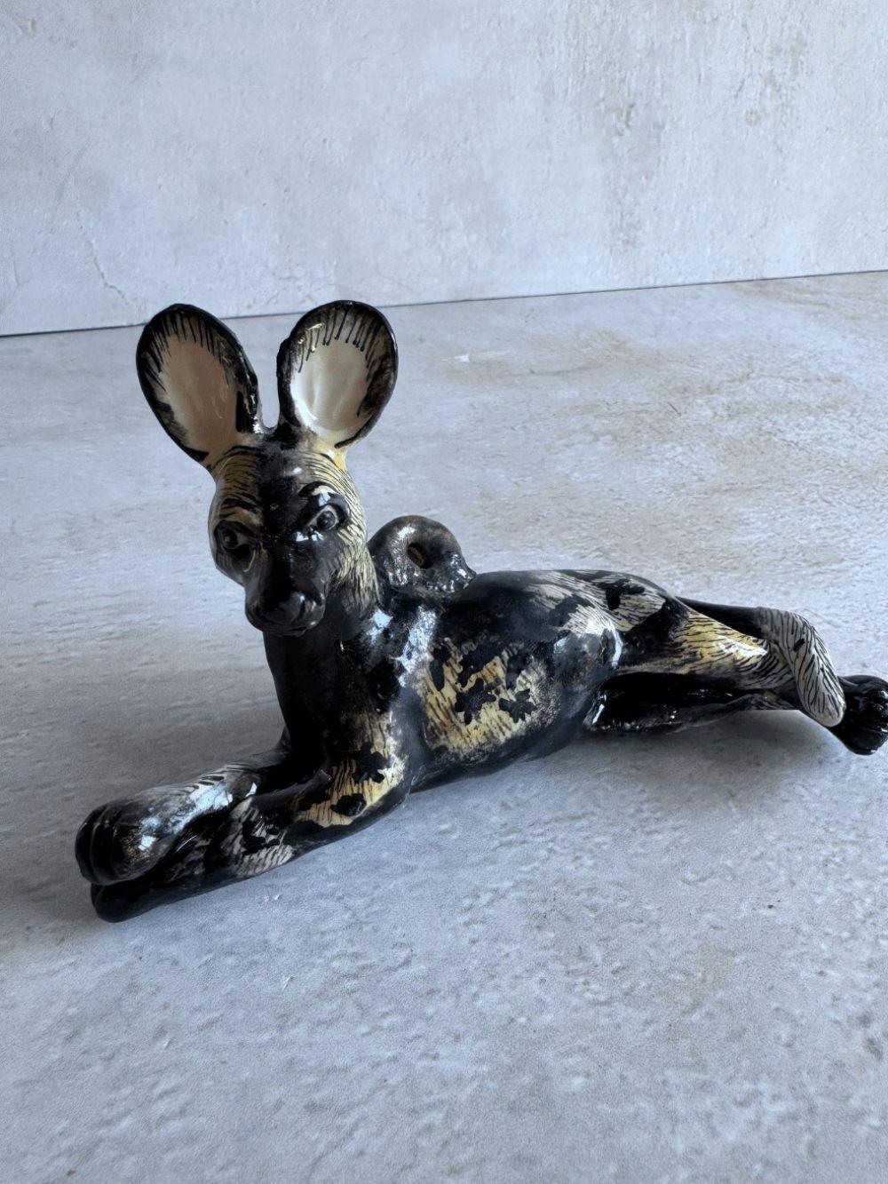 Handmade wild dog sculpture by Rachael Wild, showcasing exquisite craftsmanship and artistic detail.