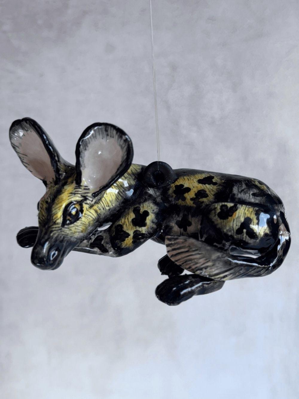 Handmade wild dog sculpture by Rachael Wild, showcasing exquisite craftsmanship and artistic detail.