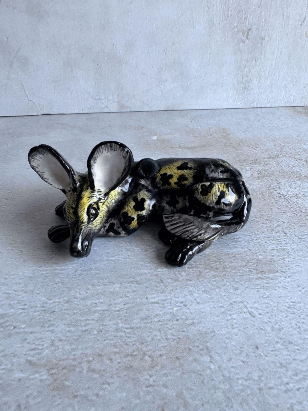 Handmade wild dog sculpture by Rachael Wild, showcasing exquisite craftsmanship and artistic detail.